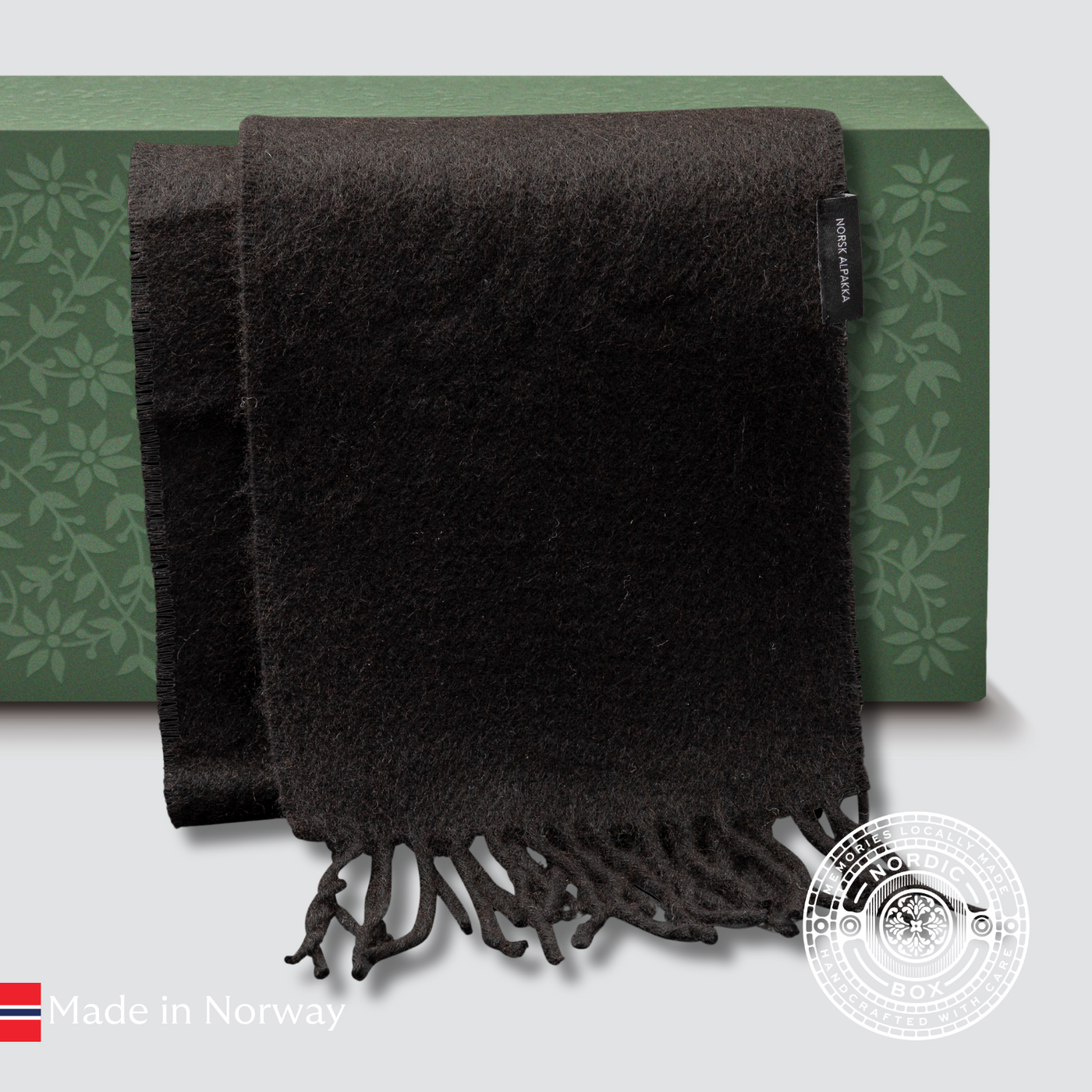 Natural black alpaca scarf, soft and fringed, crafted in Sigdal by Norsk Alpakka.