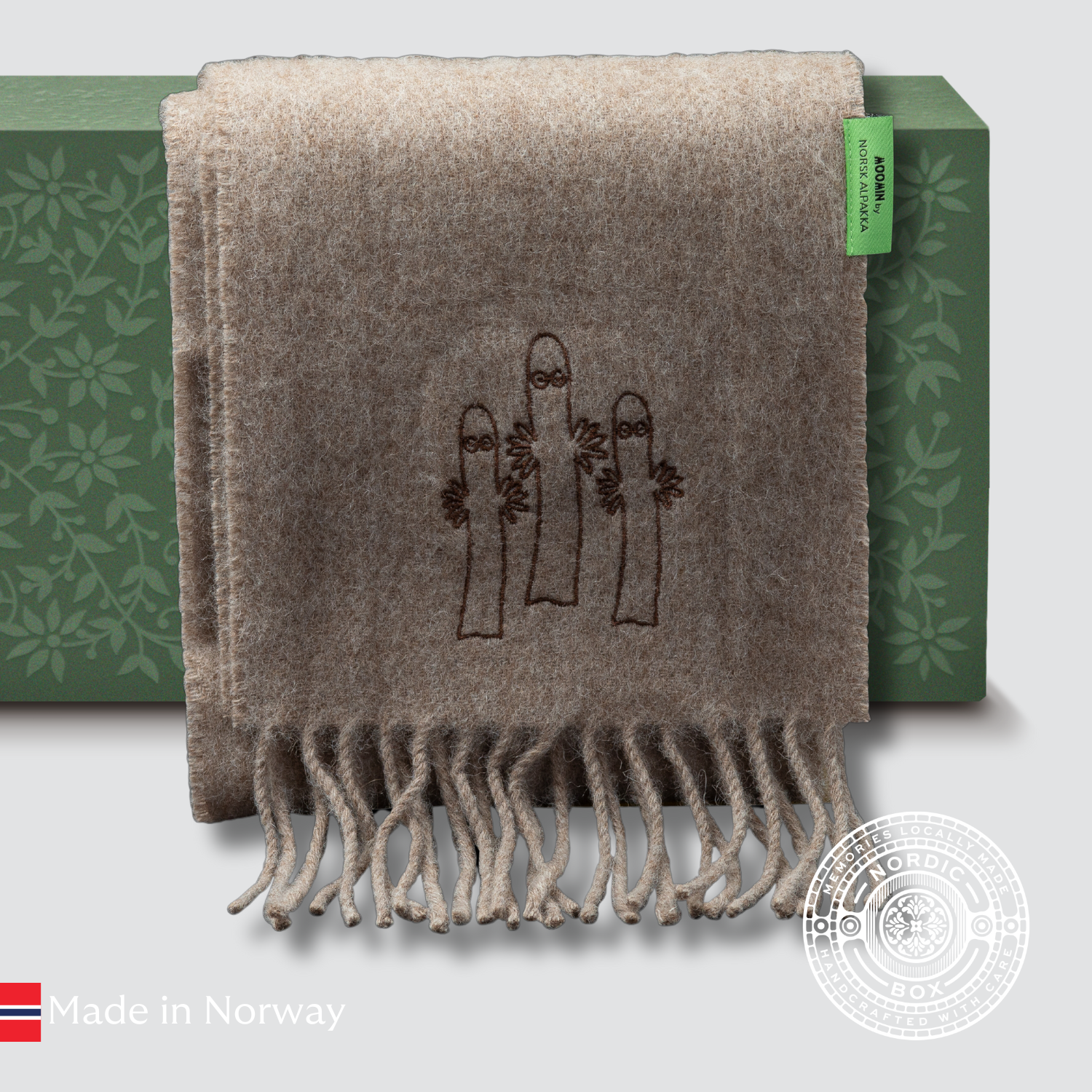 Natural brown alpaca scarf with tone-on-tone Hattifnatter embroidery, crafted in Sigdal by Norsk Alpakka.