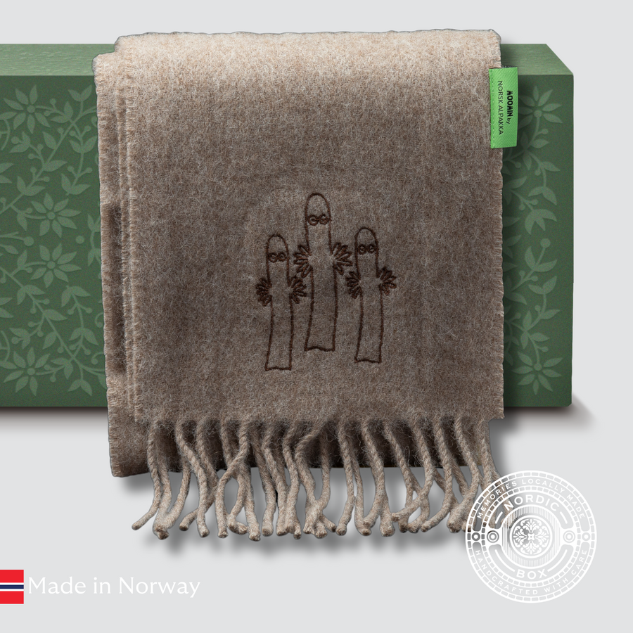 Natural brown alpaca scarf with tone-on-tone Hattifnatter embroidery, crafted in Sigdal by Norsk Alpakka.