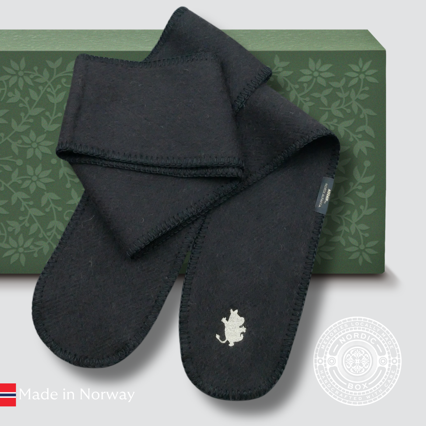 Thin black alpaca scarf and or head warmer with Moomin Troll embroidery, crafted in Sigdal by Norsk Alpakka.